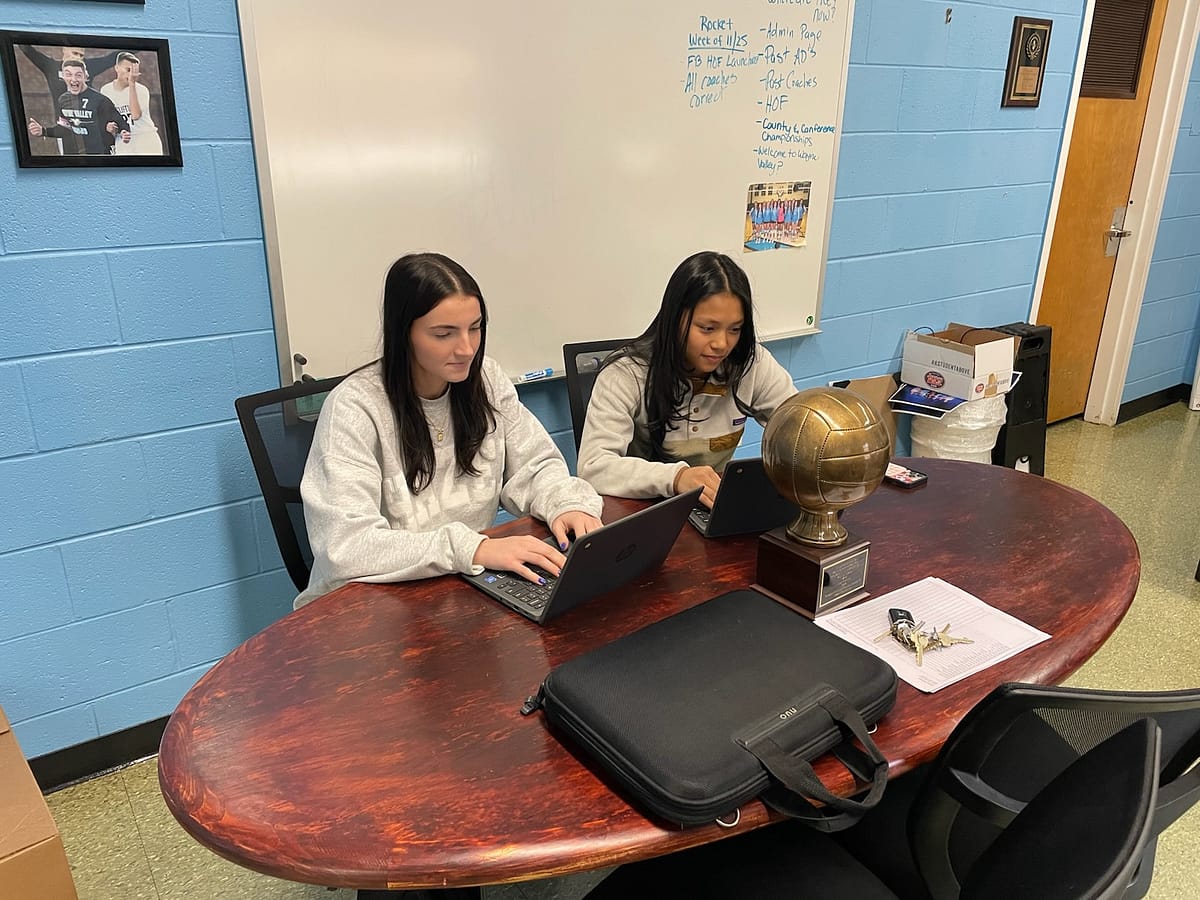 Two students at their internship with Mr. Carcich